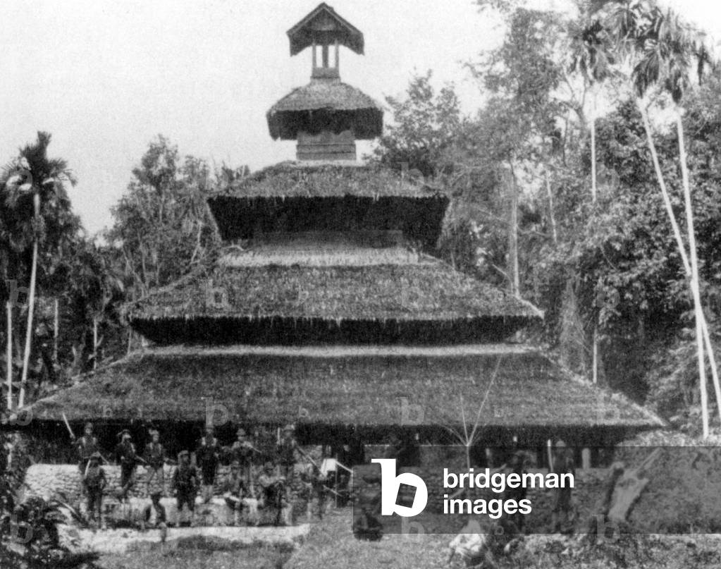 Indonesia: A late 19th-century photograph of a traditional Acehnese mosque in northern Sumatra.