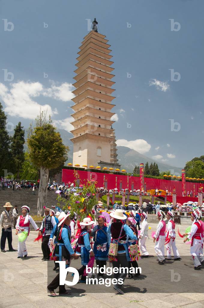 China: Bai women dancing at the Bai music and dance festival at San Ta Si (Three Pagodas), Dali, Yunnan