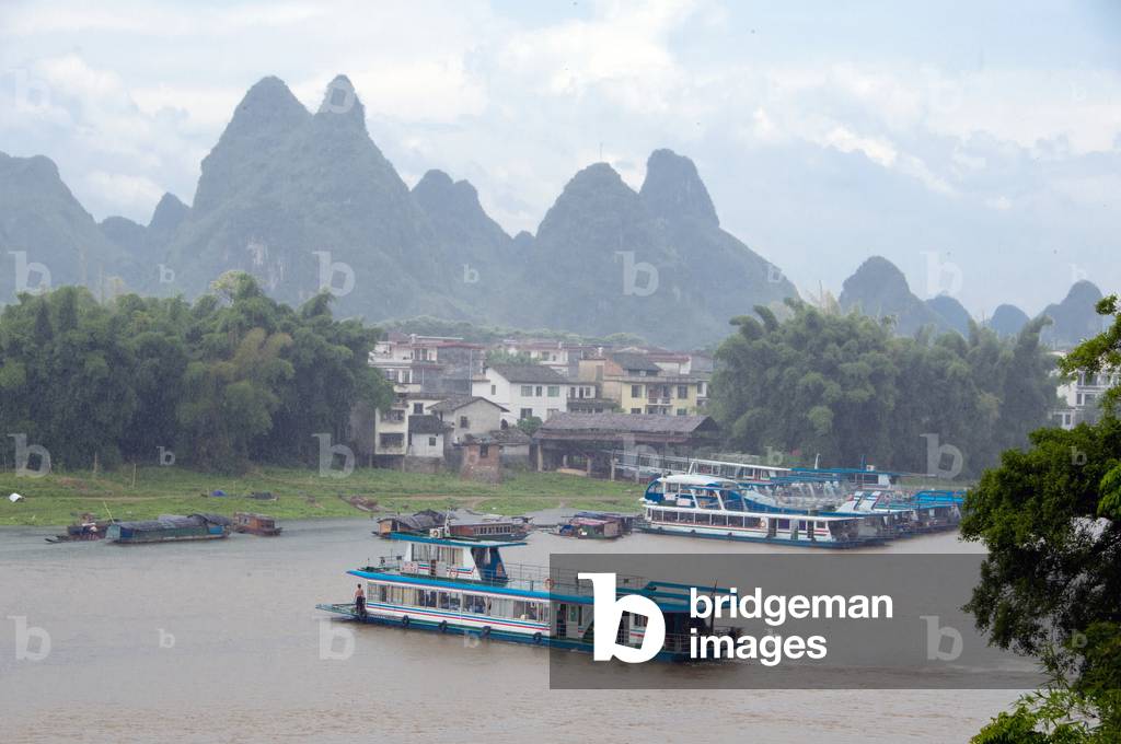 China: Boats on the Li River at Yangshuo, near Guilin, Guangxi Province
