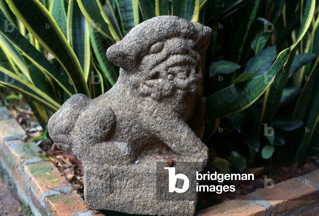 Thailand: Khmer stone lion (singha) in the garden, Jim Thompson House, Bangkok