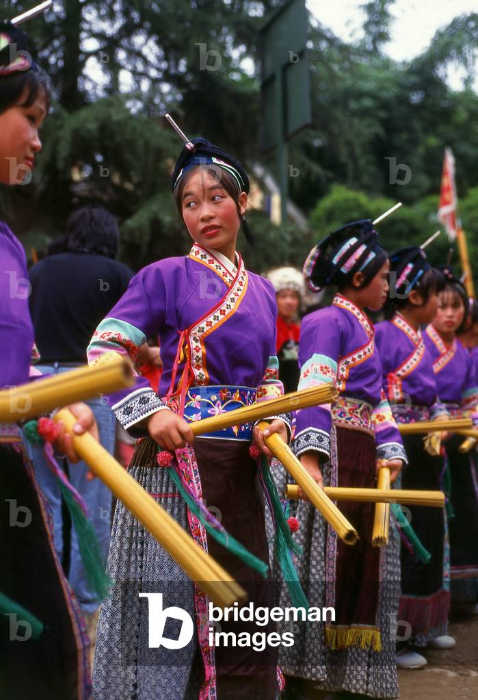 China: Miao women dancing at a Miao mask festival near Huangguoshu, Guizhou Province
