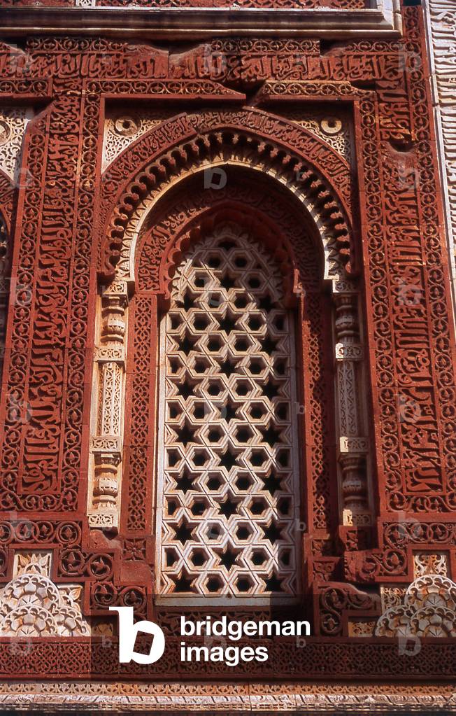 India: A jali or latticed stone screen in the Alai Darwaza (Alai Gate, built 1311 CE) next to the Qutb Minar, Delhi