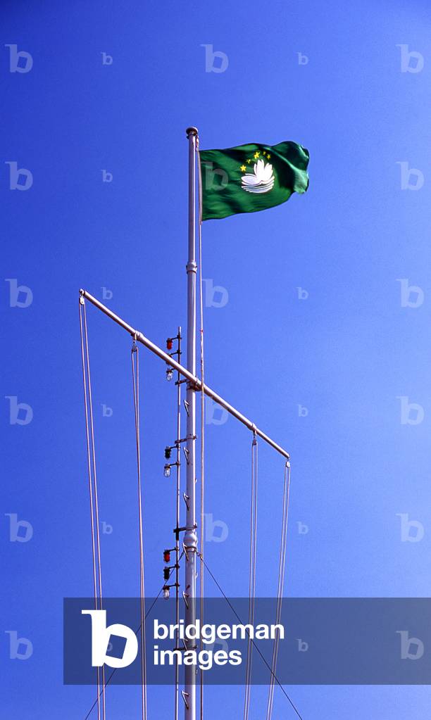 China: The flag of Macau flies over the Guia Fortress (Fortaleza de Guia), Guia Hill, Macau