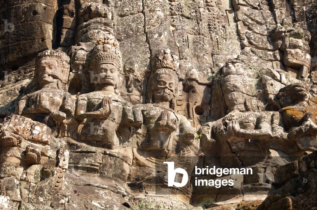 Cambodia: Apsara (celestial nymphs) adorn Victory Gate, Angkor Thom, Angkor