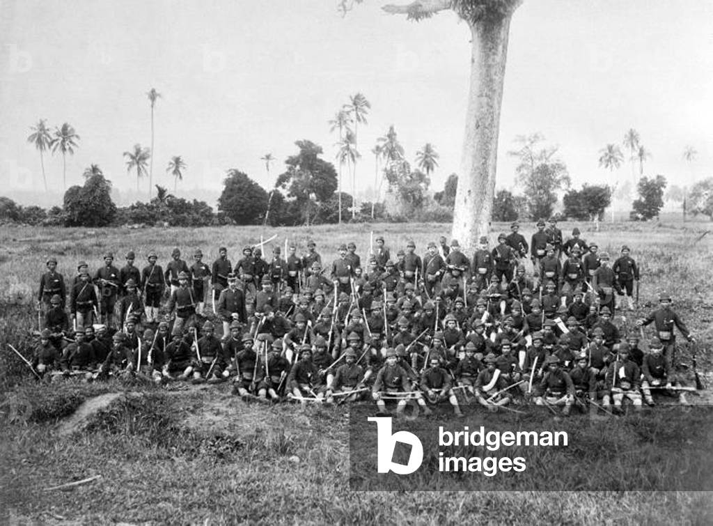 Indonesia / Netherlands: Group portrait of a brigade of the Korps Marechaussee in Aceh, c. 1900. Aceh War (1873 - 1914)