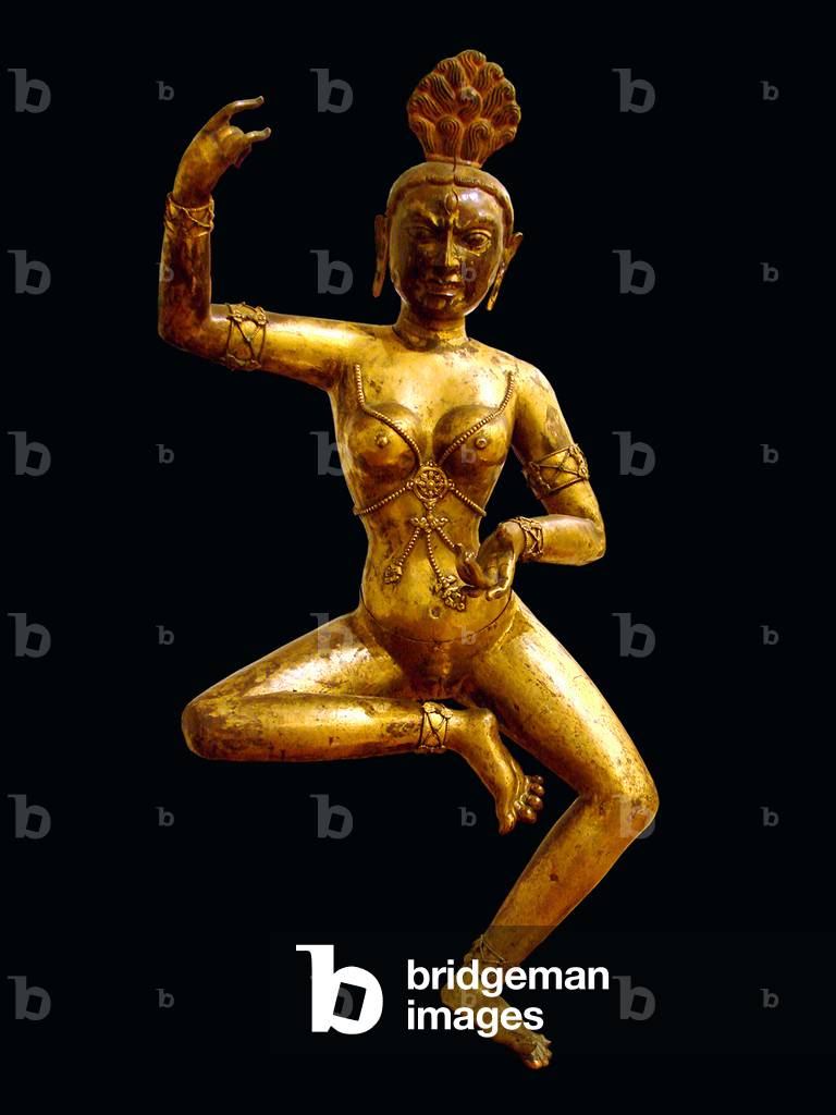 China / Tibet: A gilded Dakini, dancing, 18th entury