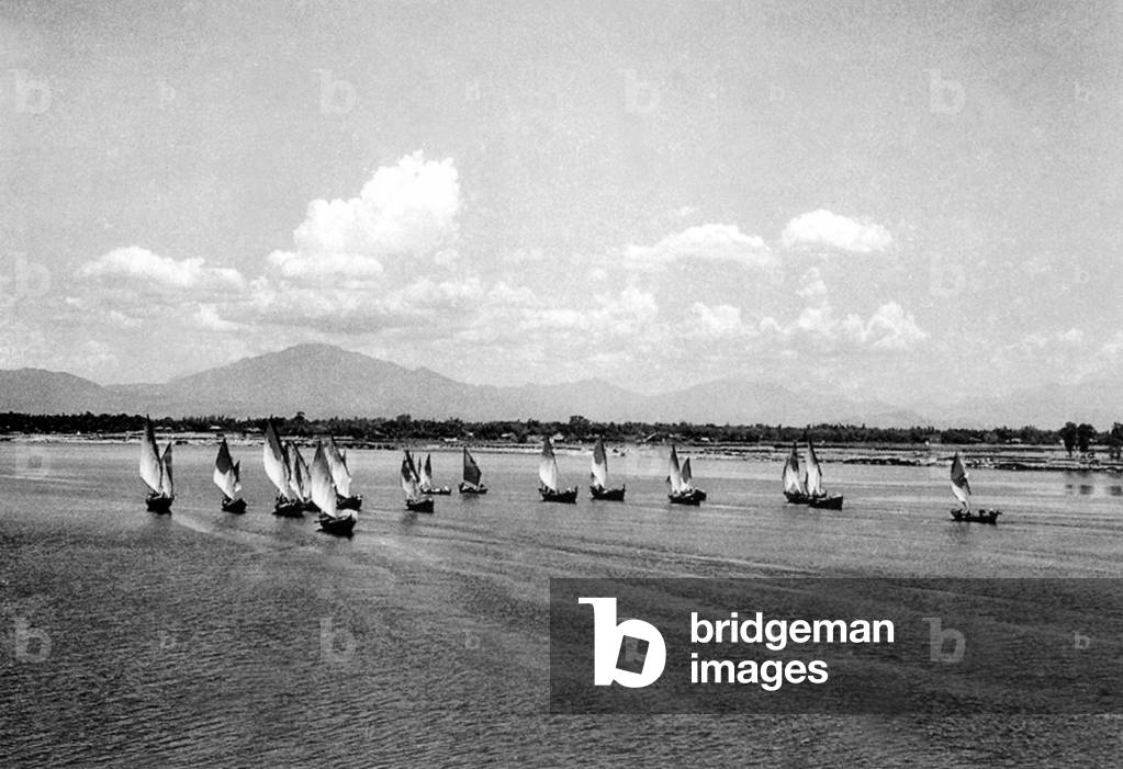 Vietnam: Fishing boats putting to sea near Hoi An (1950)
