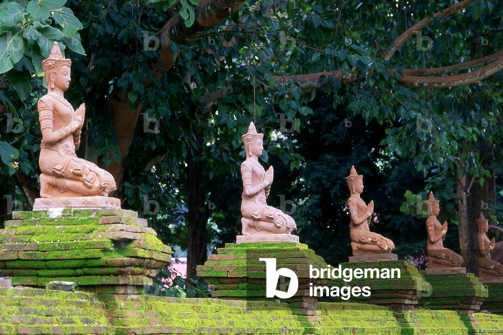 Thailand: Moss covered wall at 14th century Wat Chedi Luang, Chiang Saen, Chiang Rai Province, Northern Thailand