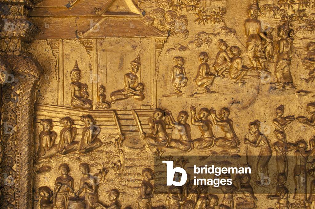 Laos: Golden bas-relief at the entrance to the sim (ordination hall), Wat Mai Suwannaphumaham, Luang Prabang