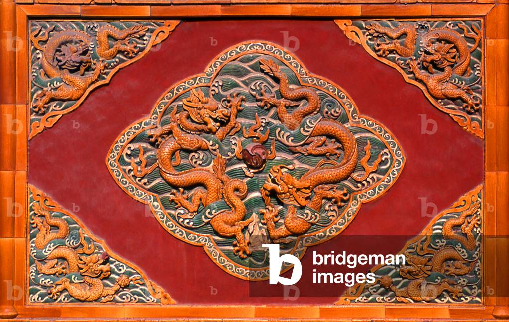 China: Elaborate dragon panel on the second arched gate in Chanfu (Heavenly King) Temple, Beihai Park, Beijing