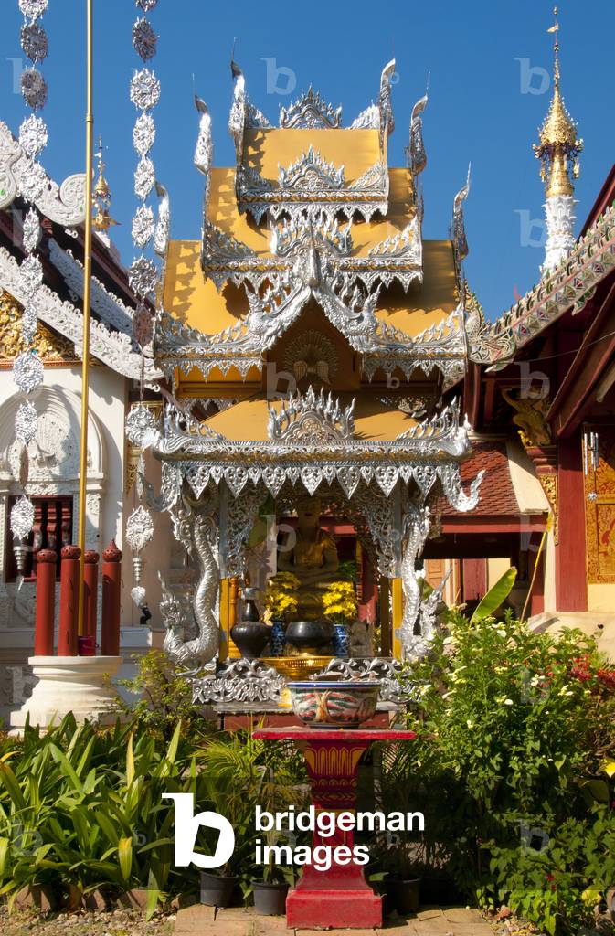 Thailand: Buddha in front of the ubosot (ordination hall) and viharn, Wat Mahawan, Chiang Mai, northern Thailand
