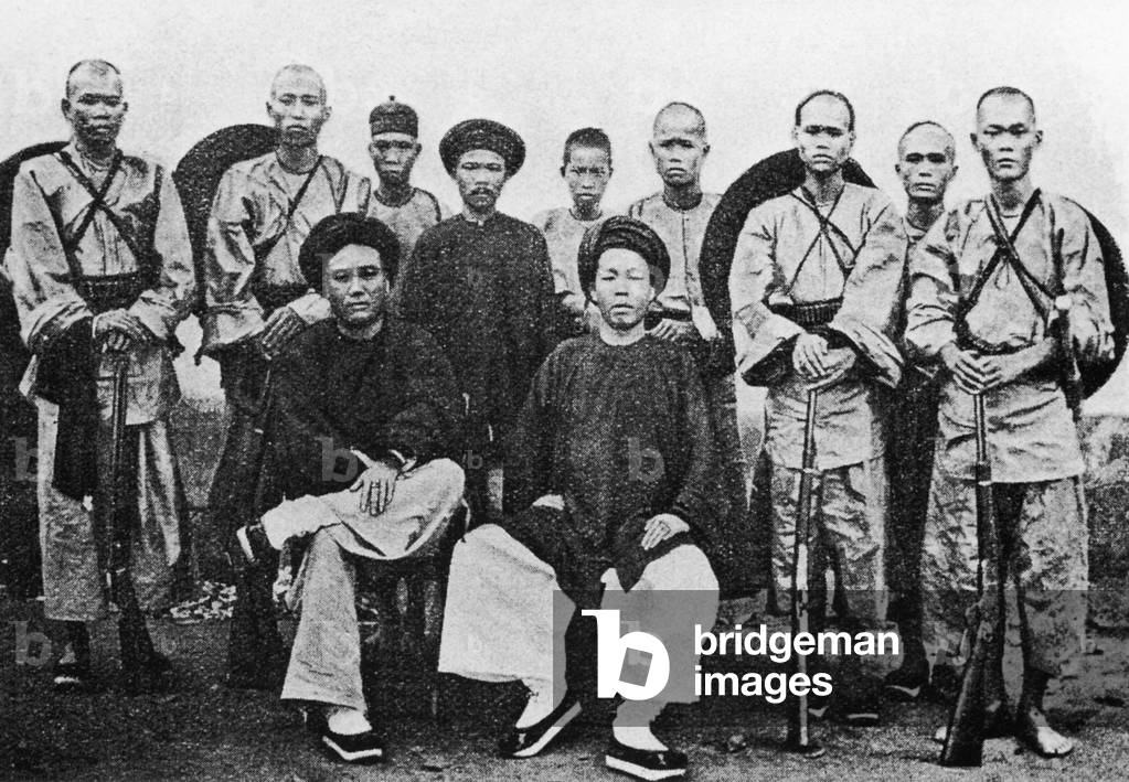 White Tai militia under the command of Deo Van Tri (seated left) during the Haw Wars, c. 1875 (b/w photo)