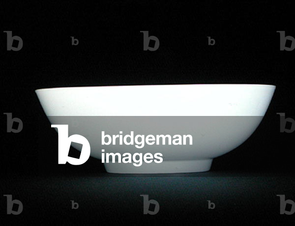 A white glazed Anhua bowl carved with dragons (ceramic)