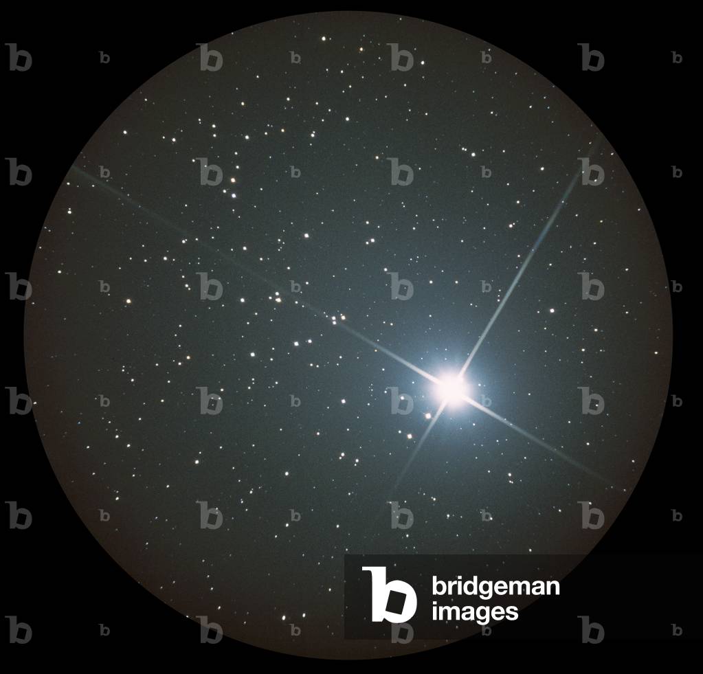 Jupiter in the open cluster M44 - Planet Jupiter in the open cluster M44 - M44 is a cluster of stars located only 600 light years from Earth, in the constellation Cancer. Illuminating the image, the planet Jupiter. Bright Jupiter among M44 stars; this cluster is located about 600 light year away in Cancer. This skyview is corresponding to binoculars and small telescopes