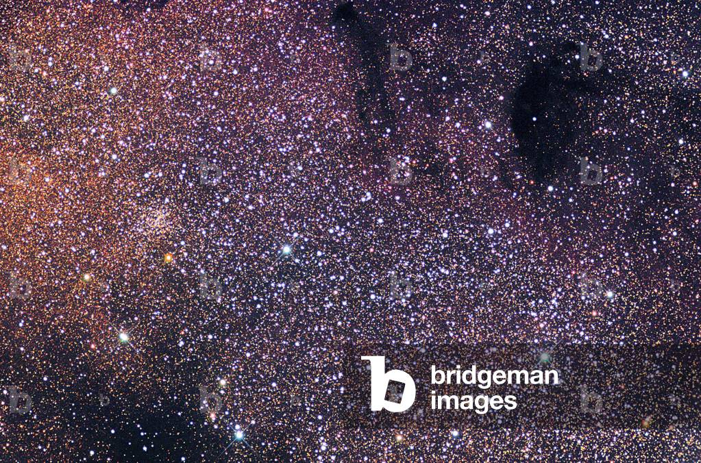 M24 in Sagittarius - M24 star cluster in Sagittarius - Central part of the star cloud M24. On the left, the cluster of stars NGC 6603; on the upper right, two dark nebulae, Barnard 92 and 93. Center of the star cluster M24. At left, the star cluster NGC 6603. Two dark nebulas, Barnard 92 and Barnard 93 are also visible at the top of the image