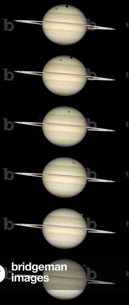 Saturn and satellites seen by the Hubble space telescope - Saturn rings edge - on with satellites - Saturn observed by the Hubble space telescope on February 24, 2009 when the Earth is in the same plane as the rings, seen by the slice. This phenomene occurs every 15 years. This sequence of images taken for just over three hours shows the movement from left to right of four satellites in front of the planet. From left to right on the top image we see the satellites Enceladus, Dione (the brightest ice satellite), Mimas and the largest satellite, Titan, orange. This sequence of images captures the parade of several of Saturn's moons transiting the face of the gas giant planet from left to right during more than three hours. This is a rare event because the rings are tilted edge on to Earth every 15 years. The top frame captures the giant moon Titan and its shadow near Saturn's northern polar hood. Tiny Mimas and its shadow have just entered the left limb of Saturn, slightly above the rings. To the far left off the disk, Dione, the brightest of the icy moons in this view - and Enceladus, fainter and farther to the left - can easily be seen just above the rings. This picture sequence was taken with Hubble's Wide Field Planetary Camera 2 on February 24, 2009, when Saturn was at a distance of roughly 775 million miles (1.25 billion kilometers) from Earth. Hubble can see details as small as 190 miles (300 km) across on Saturn