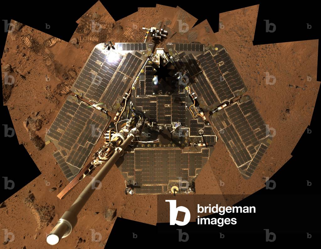 March: Rover Spirit - Self Portrait - The Rover Spirit used his panoramic camera to take several images and create this mosaic on August 27, 2005. This self-portrait shows the accumulation of Martian dust on the rover and its solar panels. The Rover Spirit landed on Mars in the Gusev crater area, July 4, 2004