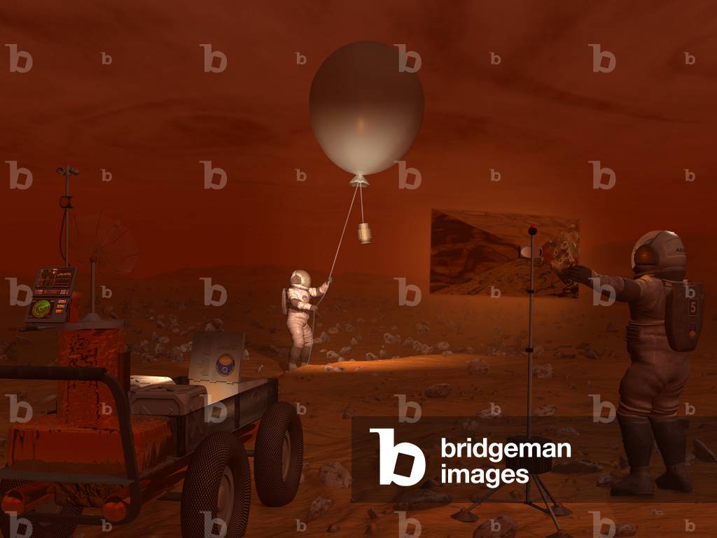 Astronauts on Titan - Illustration - Releasing a weather balloon on Titan - Astronauts make meteorological measurements on the surface of Titan. A titanian explorer prepares to release a weather balloon while another direct a flood lamp to illuminate the activity. On the left is a supply cart with a portable weather station, featuring an interactive control panel designed to accommodate hands enclosed in thick gloves. All exposed hardware would have to function at temperatures of minus 300* F and below. With an atmosphere 10 times denser than the Earth's, weather would be of keen interest to Titan's visitors. High in Titan's atmosphere wind velocities in excess of 400 mph have been detected. While not much is known about winds and weather at Triton's surface, terrain features resembling dune fields have been observed, suggesting surface winds have occurred at some locations. Fogs of methane gas would likely be present at the surface as well