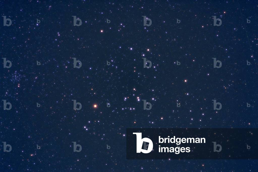 Hyad cluster - Mel 25 - The Hyades cluster in Taurus - Mel 25, the Hyades, is an open cluster visible to the naked eye in the constellation Taurus. The red giant star Aldebaran is the brightest star in the image. On the left, the small open cluster NGC 1647. The Hyades is a beautiful open cluster in Taurus that is easily visible to the unaided - eye. Brilliant Aldeberan, a 0.9 magnitude red giant star, dominates the cluster which is located about 153 light years away. Smaller open cluster NGC 1647 is on the left in the image, some 45 acr minutes in diameter at magnitude 6.4