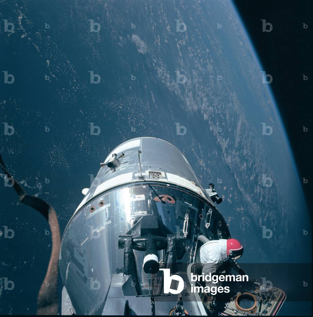 Apollo 9: release of D.Scott 03/1969 - Apollo 9: David Scott extravehicular activity - David R. Scott passing the control module lock. 06/03/1969. Apollo 9 Command/Service Modules (CSM) nicknamed “” Gumdrop”” and Lunar Module (LM), nicknamed “” Spider”” are shown docked together as Command Module pilot David R. Scott stands in the open hatch