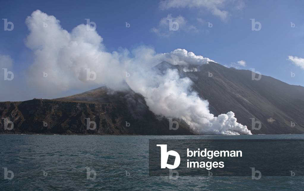 Volcano Stromboli: Lava flow on Stromboli volcano - A lava flow from Stromboli volcano enters the sea. Stromboli lavaflow with sea entry