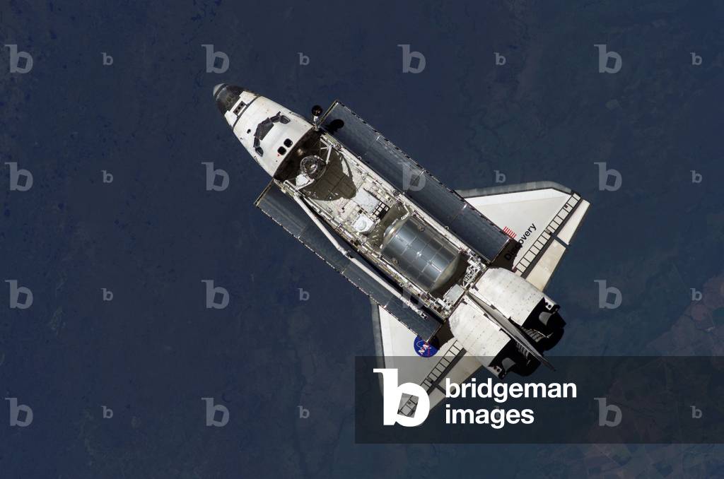 Immagine di Fotografia "Space Shuttle Discovery visto dalla Stazione Spaziale Internazionale 07 - 2006 - Shutt
