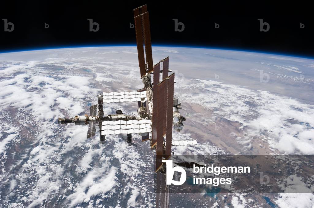 The International Space Station (ISS) 07/2011 - The International Space Station (ISS) 07/2011 - View of the International Space Station from Space Shuttle Atlantis at the end of the STS - 135 mission on 19 July 2011. The Tibetan plateau and the western part of the Himalayas are visible. This picture of the International Space Station was photographed from the space shuttle Atlantis as the orbiting complex and the shuttle performed their relative separation in the early hours of July 19, 2011 The western Himalayas and the Tibetan Plateau are visible below. Onboard the station were Russian cosmonauts Andrey Borisenko, Expedition 28 commander; Sergei Volkov and Alexander Samokutyaev, both flight engineers; Japan Aerospace Exploration astronaut Satoshi Furukawa, and NASA astronauts Mike Fossum and Ron Garan, all flight engineers. Onboard the shuttle were NASA astronauts Chris Ferguson, STS - 135 commander; Doug Hurley, pilot; and Sandy Magnus and Rex Walheim, both mission specialists