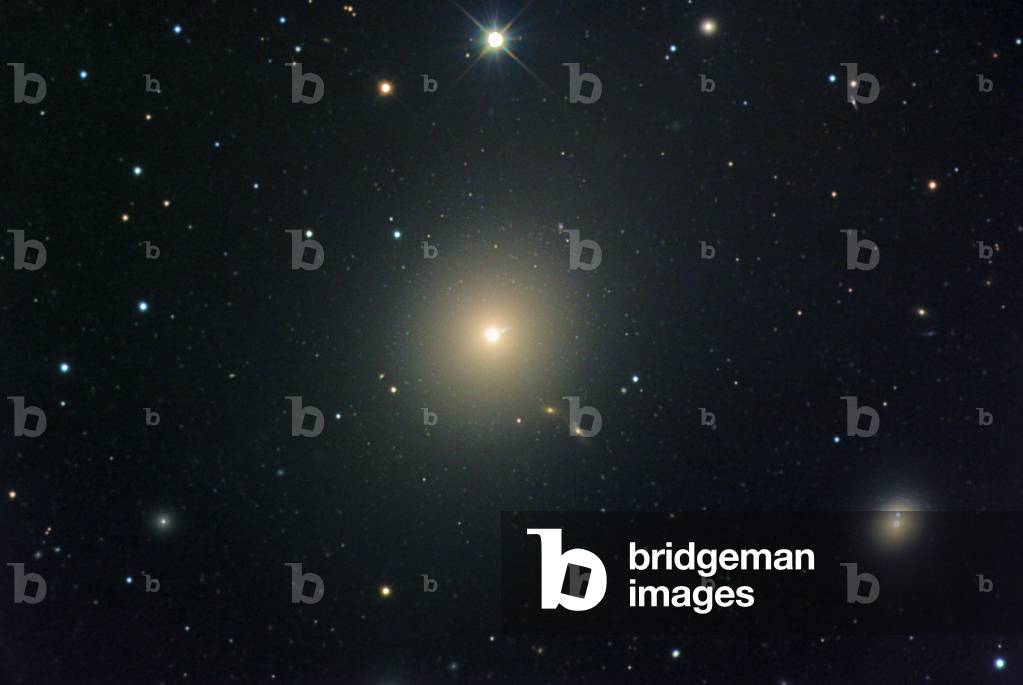 M87 elliptical galaxy in Virgo - M87 elliptical galaxy in Virgo - The M87 galaxy (NGC 4486) is located about 52 million years away - light from Earth, in the heart of the Virgin's cluster. M87 is the brightest radio source in the constellation, it is also called Virgo A. Gigantic elliptical galaxy M87 is located at the heart of the Virgo Cluster of galaxies. Also known as radio source Virgo A, M87 is located about 60 million light years away. It appears to have a linear size of 120,000 light years and a mass estimated at 2.7 trillion solar masses, and an extreme luminosity, with an absolute magnitude of about - 22