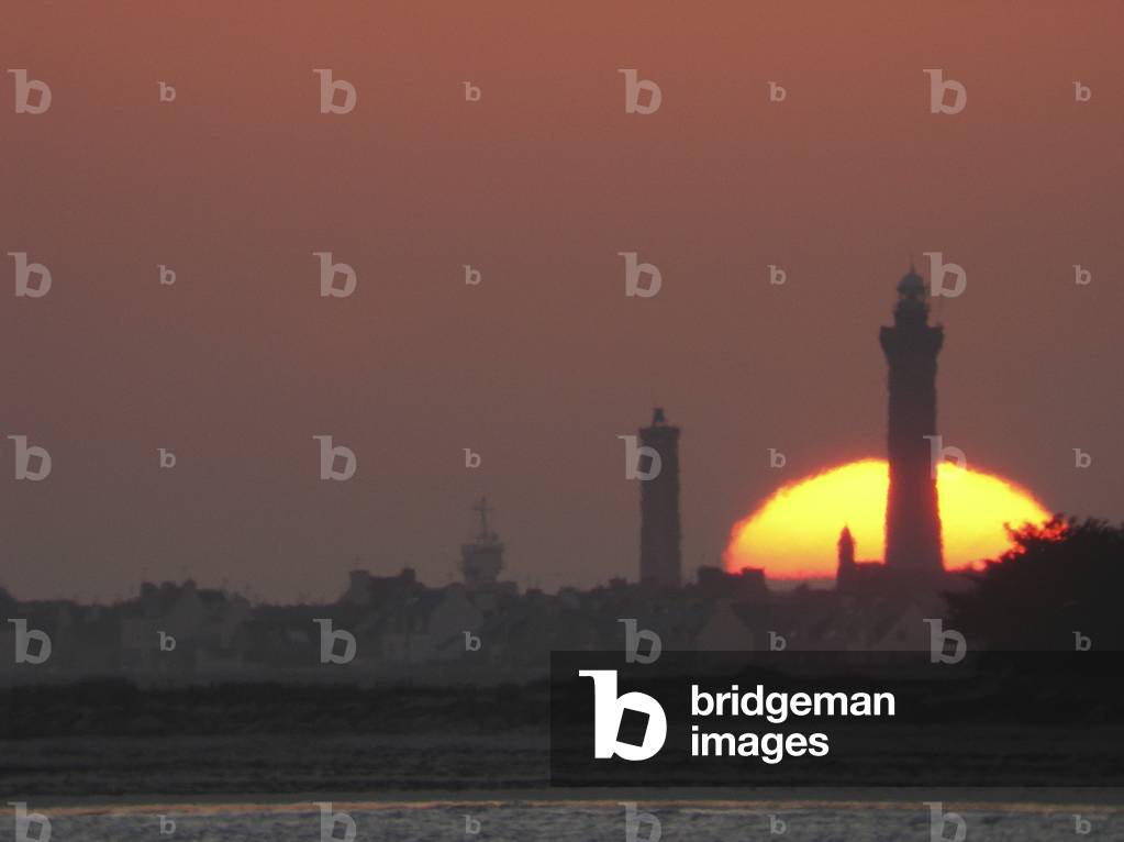 Sunset and turbulence - Sunset with strong turbulence - Sunset on the Eckmuehl Lighthouse (Penmarc'h, Finistere) photograph on March 18, 2005. March 20, 2005 was the day of the Spring equinox, when the Sun sets exactly to the west. Sunset on the lighthouse of Eckmuehl (Penmarc'h, Finistere) on March 18, 2005. On March 20, 2005 was the spring equinox, moment where the sun is setting exactly towards the west