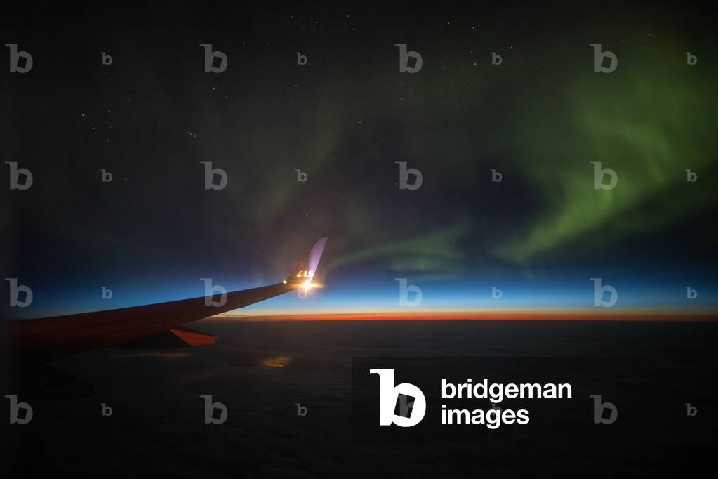 Aurore Boreale plane view - Aurora Borealis seen from plane - Aurore boreale observed from an aircraft, between Bodo and Oslo, March 27, 2017. Aurora borealis seen from a plane between Bodo and Oslo on March 27, 2017