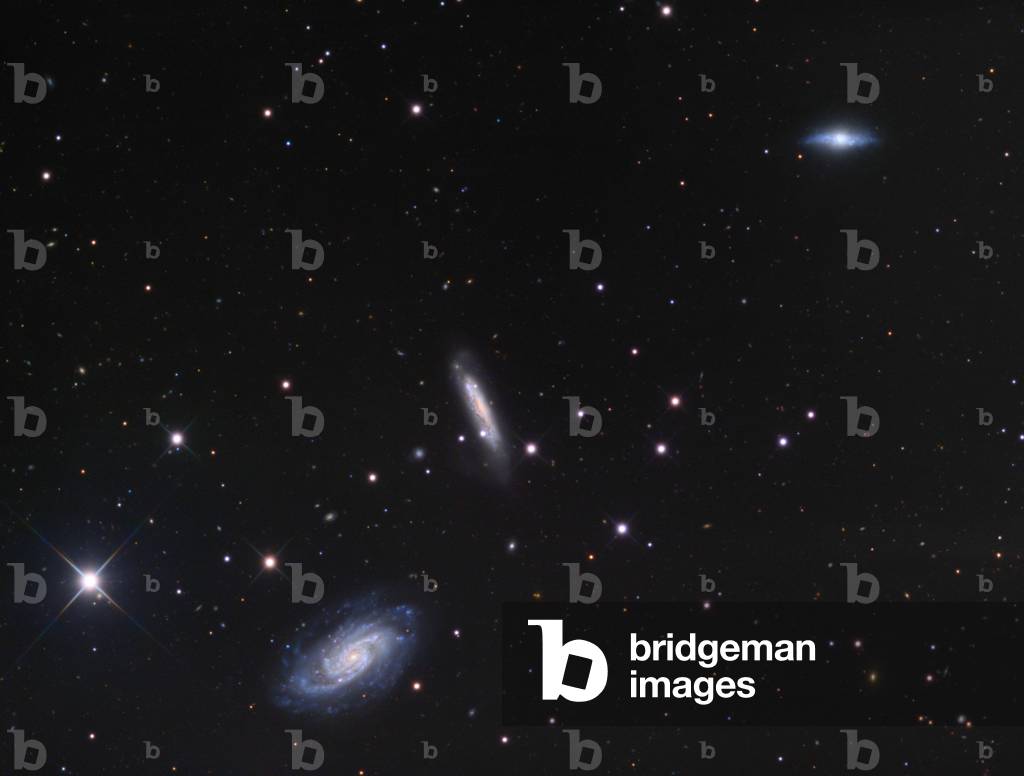 Galaxies NGC 3430 and NGC 3424 in the Little Lion - Galaxies NGC 3430 and NGC 3424 in Leo Minor - Galaxy NGC 3430 (bottom) and NGC 3424 (middle). Image obtained with a telescope 61 cm in diameter. Galaxy NGC 3430 (bottom), and NGC 3424 (middle)