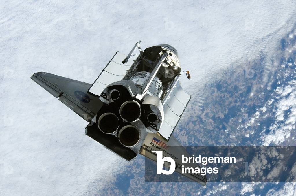 Shuttle Discovery STS - 120 view of ISS 10 - 2007 - Discovery is approaching ISS 10 - 2007 - Shuttle Discovery approaching the International Space Station. In its cargo bay, the new Harmony module (Node 2). 25 - 10 - 2007 25 Oct. 2007 Backdropped by a colorful Earth, Space Shuttle Discovery is featured in this image photographed by an Expedition 16 crewmember during a backflip maneuver performed by the approaching visitors (STS - 120) to the International Space Station