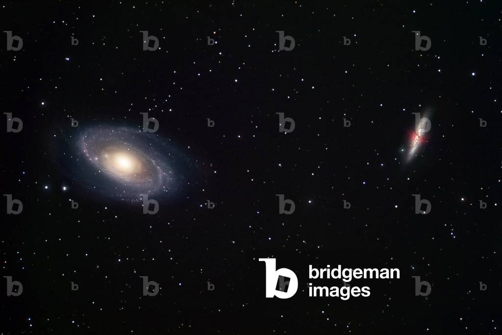 Galaxies M81 and M82 in the Great Bear - Galaxies M81 and M82 in Ursa major - M81 (left) is a spiral galaxy. M82 (right) an irregular galaxy. Separated for about 150,000 light years, these two galaxies belong to the galaxy cluster closest to our local group. These galaxies are approximately 12 million light years away from Earth. M81, seen here at left, is a grand design spiral galaxy that forms a physical pair with irregular galaxy M82. They are separated by 150,000 light years at a distance of 12 million light years. This galaxy group, consisting of M81, M82, NGC 3077 and NGC 2976, is the nearest galaxy group to our own local group of galaxies that contains the Milky Way, Magellanic Clouds, M33, and the M31 - M32 - M110 system