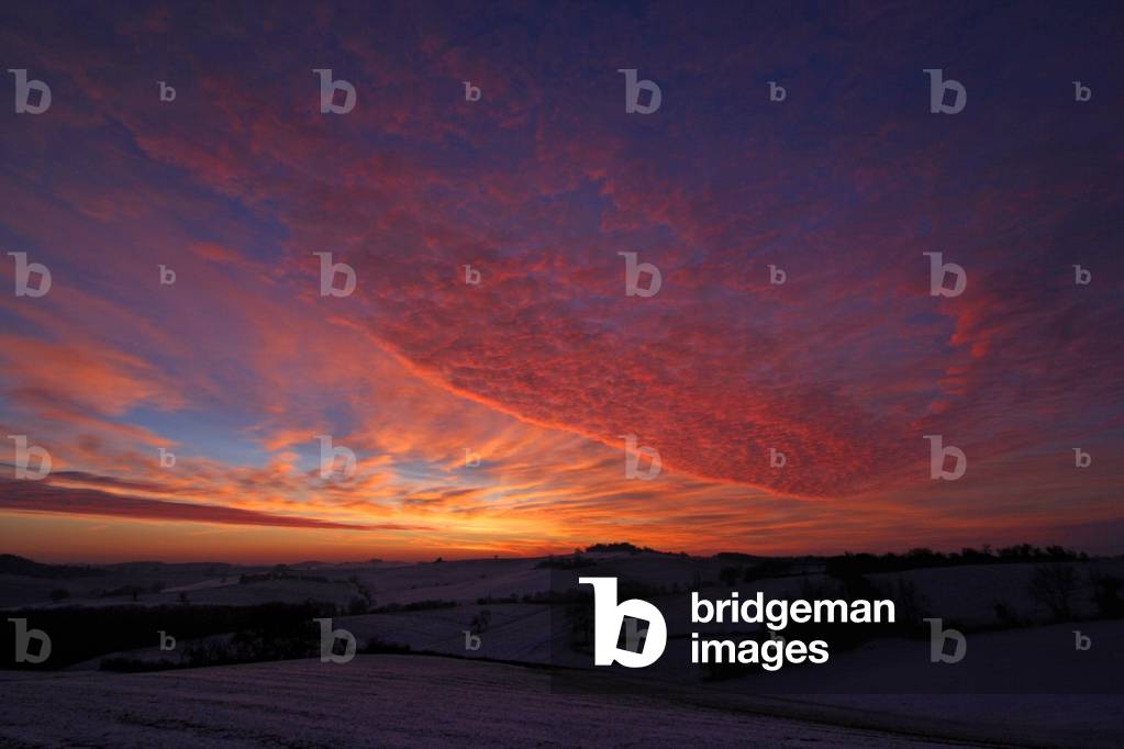 Landscape at Sunrise - Coloured clouds at sunrise - Sunrise taken in January 2010 in the Gers. Sunrise in winter. January 2010, Gers, France