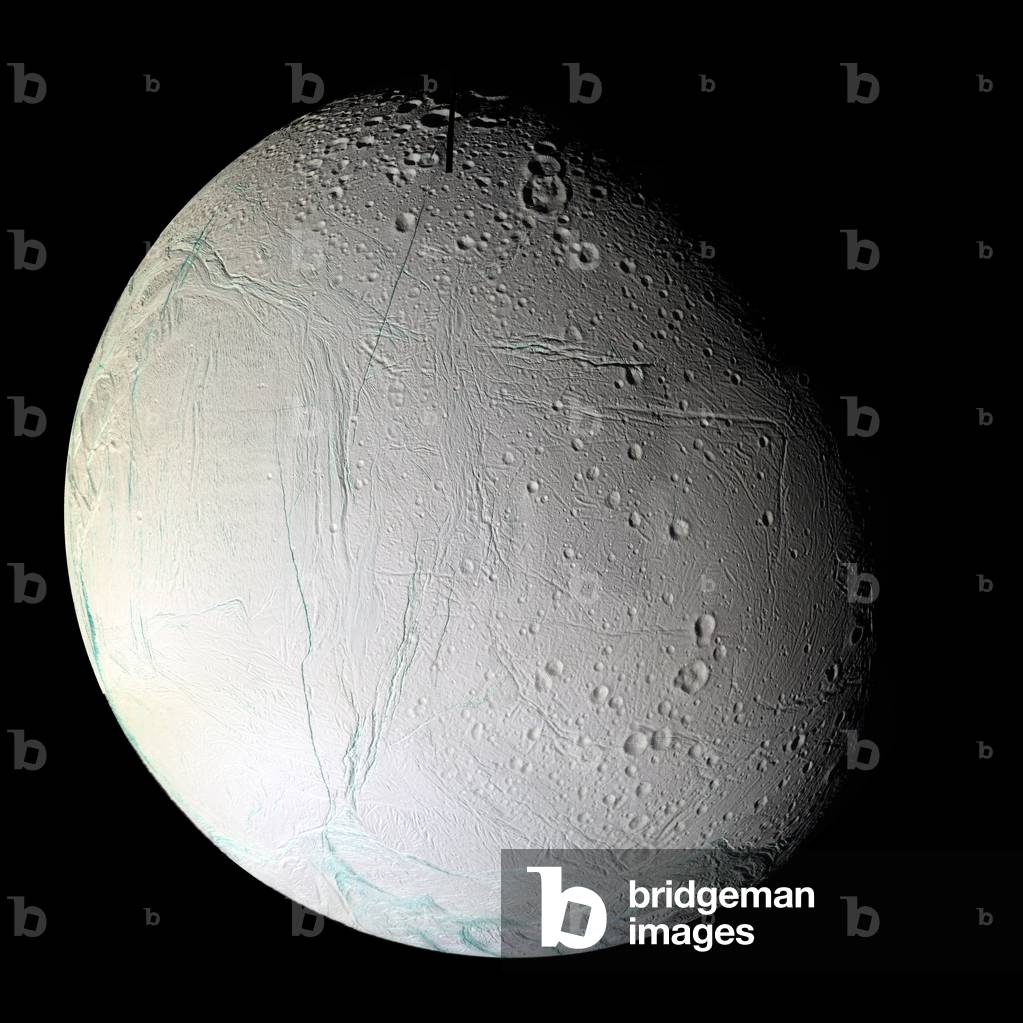 Enceladus, satellite of Saturn, seen by Cassini - Enceladus, satellite of Saturn, seen by Cassini - Mosaic of 25 images obtained by the Cassini probe during the flight over this satellite on March 9, 2005. The image shows the side of Enceladus opposite Saturn. Many cracks and impact crateres are visible