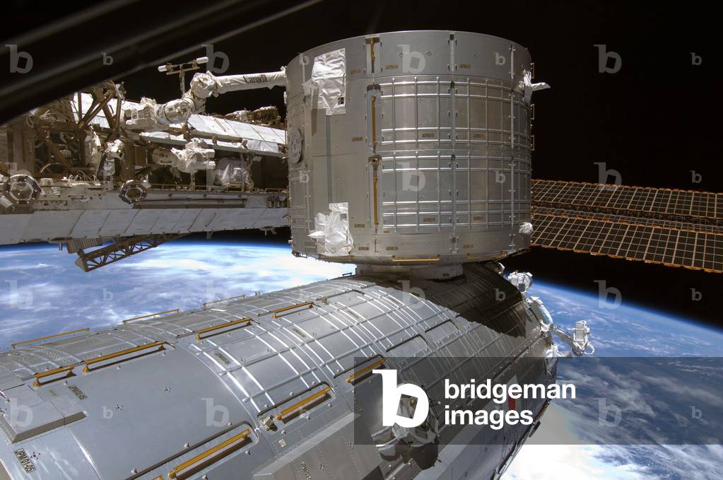 The International Space Station (ISS) 06/2008 - The International Space Station (ISS) 06/2008 - View of the Japanese JEM module installed on the International Space Station during the STS-124 mission in June 2008. The Kibo Japanese Pressurized Module and Kibo Japanese logistics module of the International Space Station are featured in this image photographed by a STS - 124 crewmember while Space Shuttle Discovery is docked with the station. The blackness of space and Earth's horizon provide the backdrop for the scene. (June 6 2008)