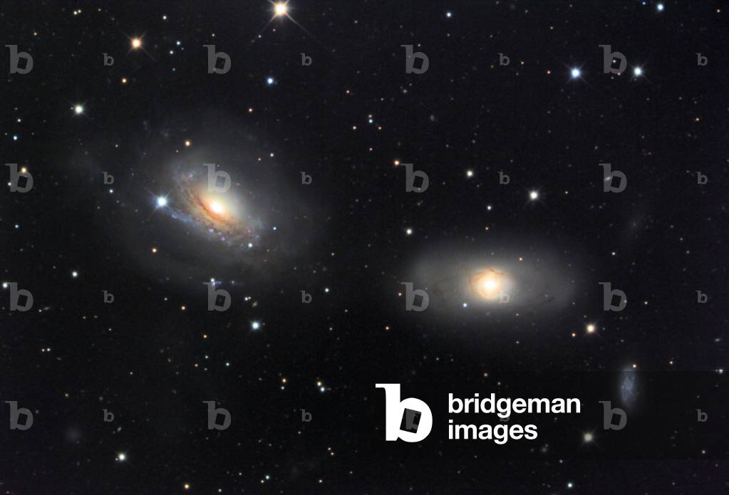 Galaxies NGC 3169, NGC 3166, NGC 3165 in the Sextant - Galaxies NGC 3169, NGC 3166, NGC 3165 in Sextans - Group of spiral galaxies located about 60 million light years away from Earth. On the left is the galaxy NGC 3169, in the center is the galaxy NGC 3166, in the bottom right is the galaxy NGC 3165. Group of spiral galaxies at about 60 million light years away. Left is NGC 3169, center is NGC 3166, bottom right, NGC 3165