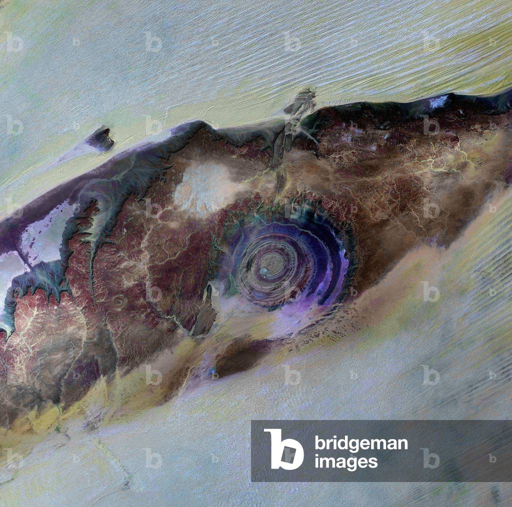 Richat structure - Mauritania - satellite view - Richat structure, Mauritania, seen by Landsat - 7 satellite - Richat structure, geological formation of volcanic origin, in Mauritania, observed by the Landsat-7 satellite. The so-called Richat Structure is a geological formation in the Maur Adrar Desert in the African country of Mauritania. Although it resemble an impact crater, the Richat Structure formed when a volcanic dome hardened and gradually eroded, exposing the onion - like layers of rock