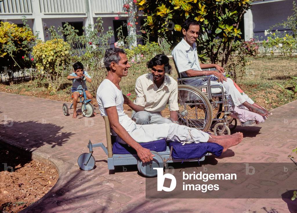 Patients on wheelchairs and carts at CMC Hospital, Vellore, Tamil Nadu, South India (photo)