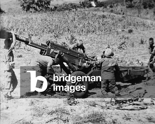 105mm howitzer of 1st Cavalry Division in action during Operation John Paul Jones, 1968 (b/w photo)