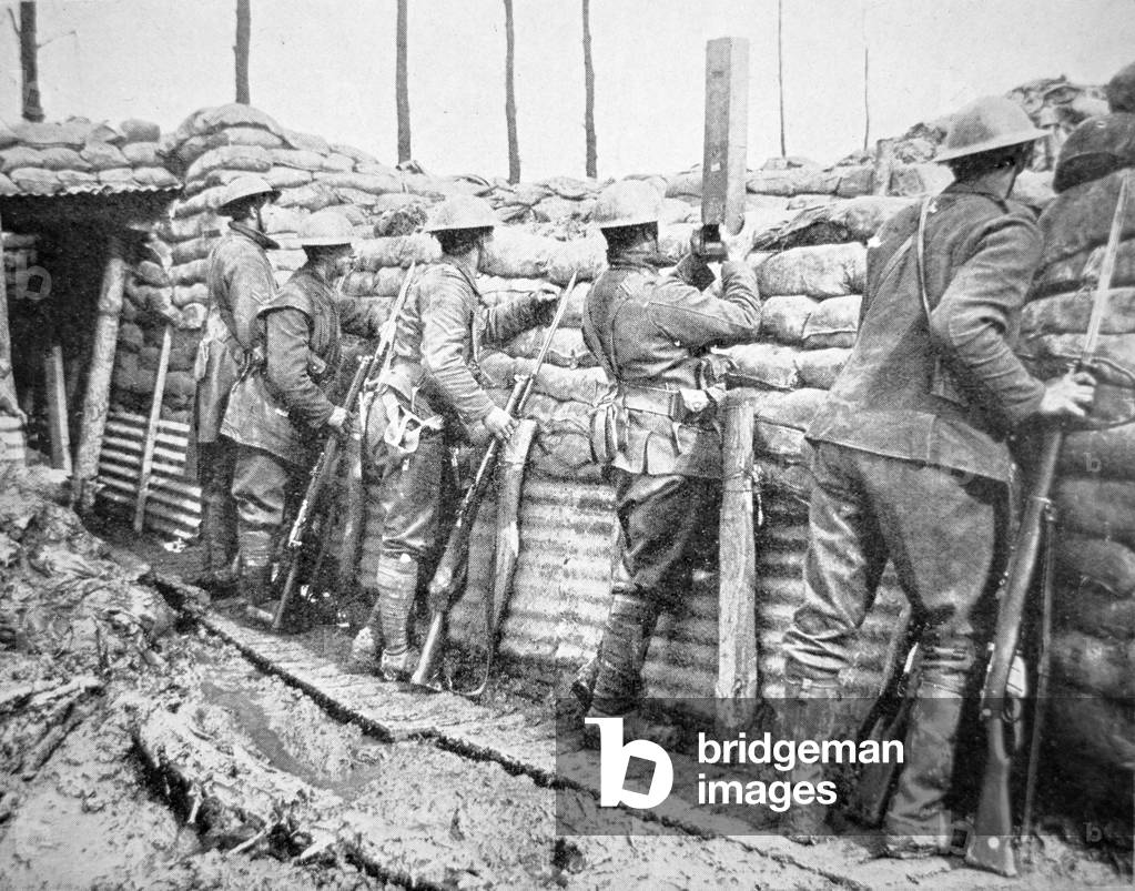 Canadian troops standing alert in their trench with bayonets fixed, 1914-18 (b/w photo)