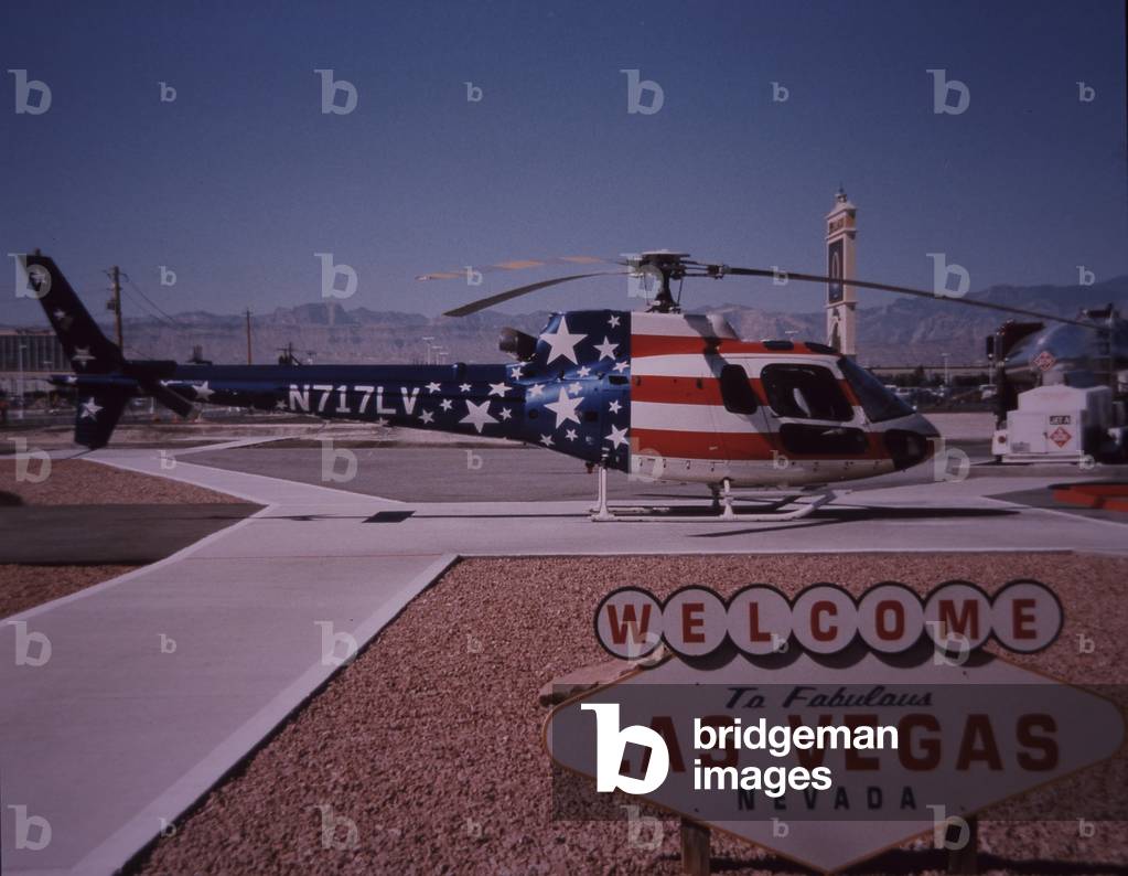 Welcome sign with tour helicopter, Las Vegas, Nevada, USA, 1999 (photo)