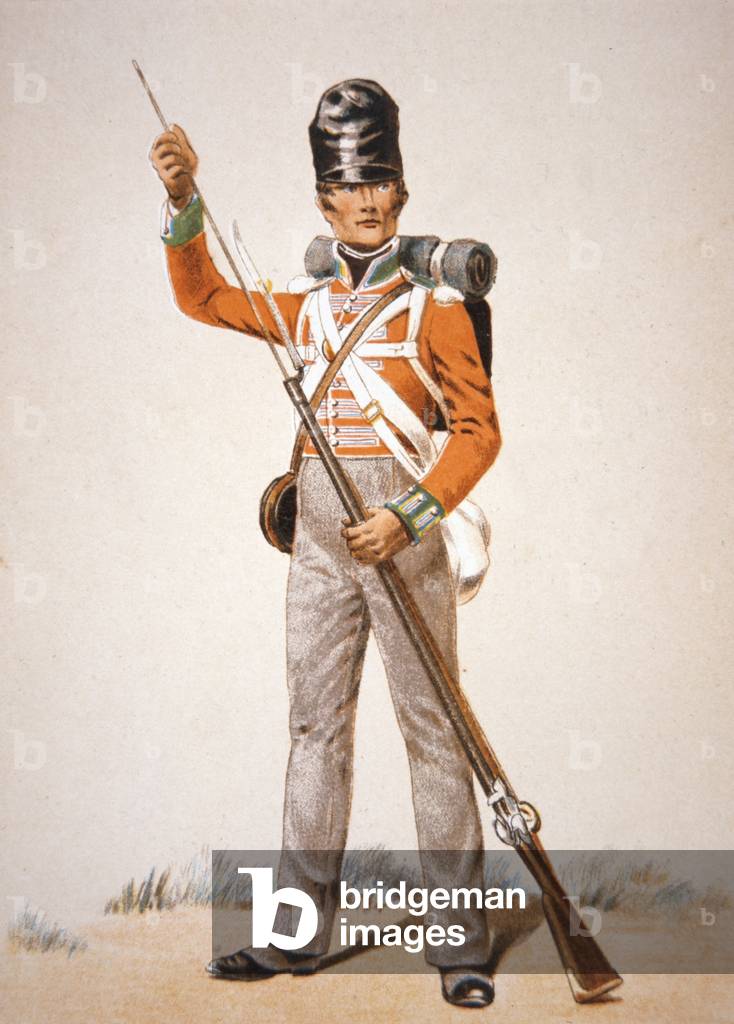 Wellington's Army: soldier of the 69th Foot loading his 'Brown Bess' musket in 1815 (colour litho)