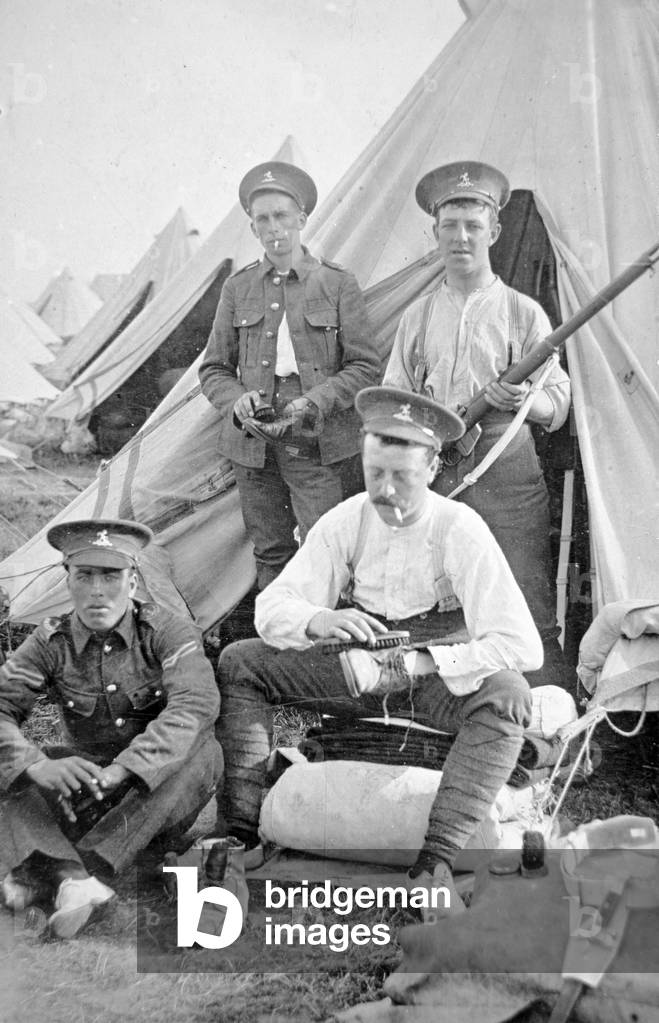 British soldiers in camp cleaning their kit, 1914 (b/w photo)