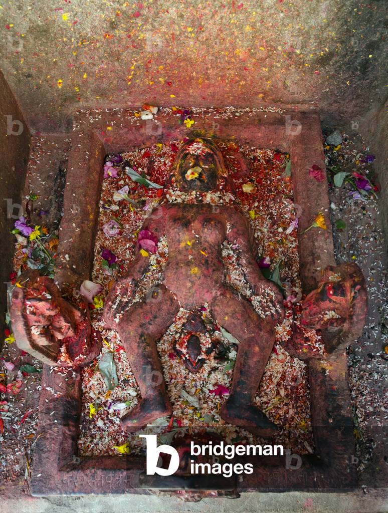 Sculpture of Earth Goddess Dharti Ma giving birth, 
Bagh Bhairav Temple (oldest temple complex in Kirtipur), 
Kirtipur, Kathmandu Valley, Nepal (photo)
