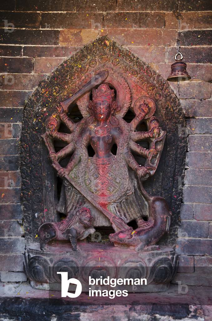 Sculpture of Hindu goddess Durga (aka. Devi, Shakti), 
Uma Maheshwar Temple (Hindu Shiva temple), 
Kirtipur, Kathmandu Valley, Nepal (photo)