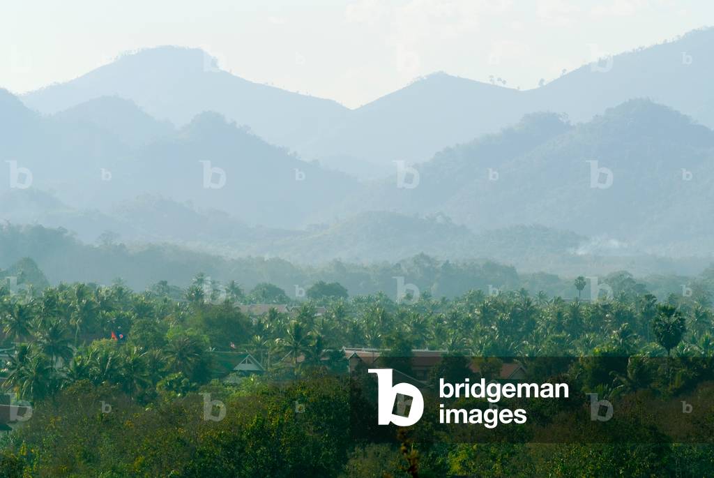 The Luang Prabang Range with a settlement in the foreground (photo)