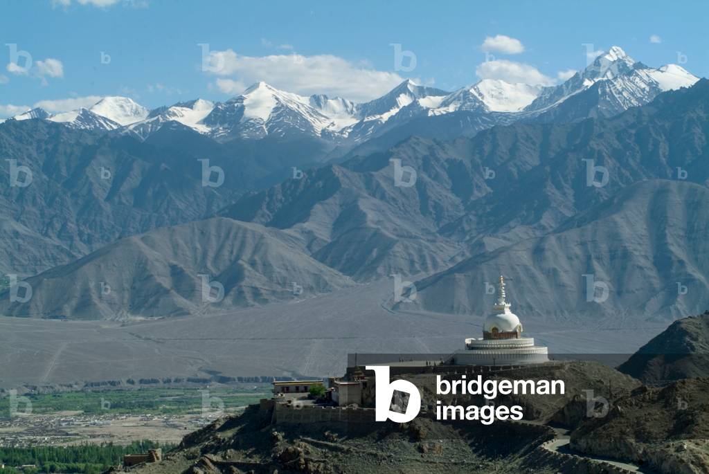 Shanti Stupa (built by Japanese order around Fujii Guruji to promote world peace through Buddhism, inaugurated 1985 to commemorate 2500 years of Buddhism), Indus Valley & Stok Kangri Massif (Zanskar Range) in bckgnd. Leh, Ladakh, Himalayas, Jammu&Kashmi (photo)