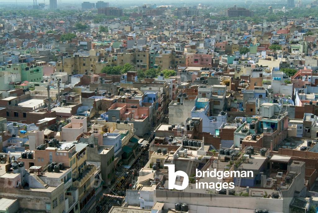 View across rooftops of Old Delhi towards New Delhi Delhi, India (photo)