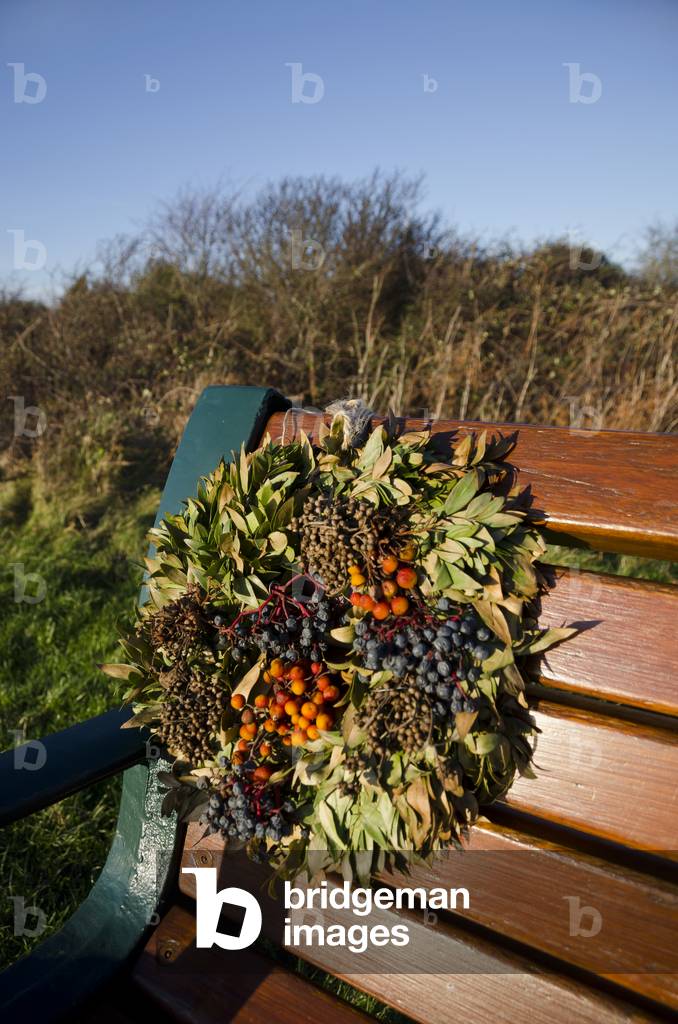 Memorial wreath on public countryside bench, Gower, South Wales, United Kingdom, 2020 (photo)